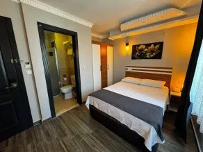 Lopera Beach Hotel - Værelse