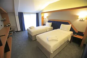 Roof 264 Hotel & Suites - Habitación