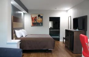 Grand Villa Inn and Suites Westchase/Chinatown - Chambre