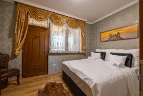 Vörös Álom Apartman Panzió - Habitación