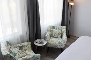 Hometel Suites - Chambre