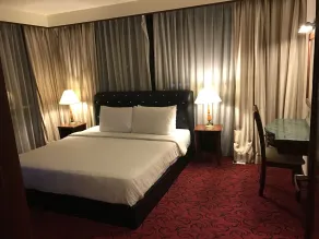 Times Square Service Suites - Chambre