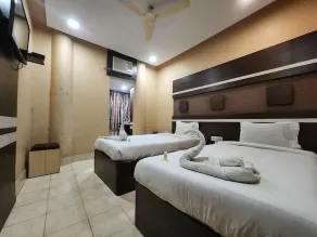 Hotel Pushpak International - Chambre