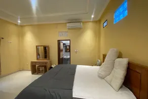 Capital O 93844 Arta Adi Homestay NearBali Zoo - Zimmer