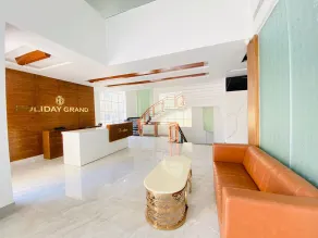 Hotel Holiday Grand - Réception