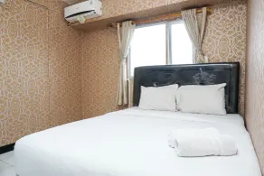 Amazing 1BR Apartment at The Wave Kuningan By Travelio - Zimmer