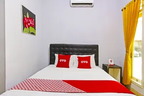 Hotel O Homestay Al Maidah - Chambre