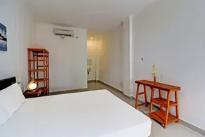 Capital O 92094 Hotel Kertha - Chambre