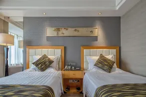 Yungang Jianguo Hotel - Room