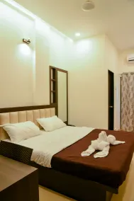 Malvan's Aishwarya Hotel - Room