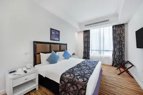 Plaza Inn Hotel - Chambre