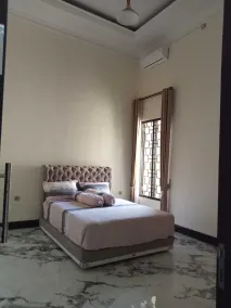 EXPRESS O 91708 Rumah Sriwijaya 12a Syariah - Habitación