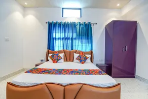 FabExpress Savitri Resort - Habitación