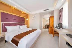 Huayi Hotel - Chambre