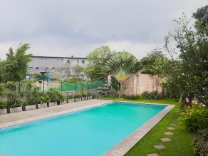 Homey and Comfact Studio at Medina Apartment By Travelio - Pool