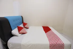 Hotel O Baloi Homestay - Chambre