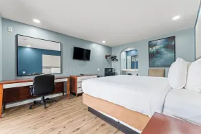 Executive Inn & Suites Magnolia - Chambre