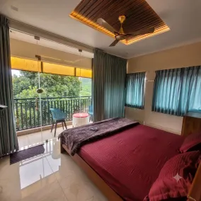 Vasu Inn - Rooms in Valparai - Habitación