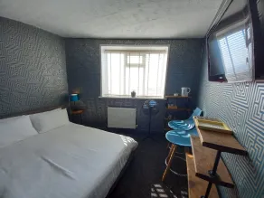 Vinnie's Family Hotel - Chambre