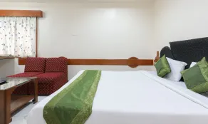 Treebo Omni Palace - Habitación