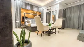 The Elegance Resort # Big Swimming Pool # Luxury Rooms # Garden # Playing Zone # Away From City Hustle # Property Of The Year # - Room