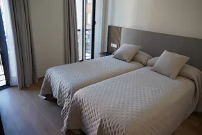VILLAGRADO Suites - Zimmer