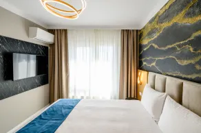 Elitte Inn & Suites - Zimmer