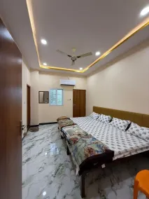 Rajguru Guest House - Quarto