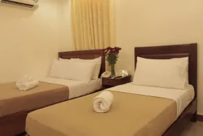 Ipil Suites Puerto Princesa - Zimmer
