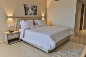 Triumph White Sands Hotel - Chambre