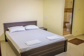 Ganesh Home Stays - Chambre