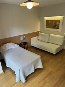 Apartamentos León - Camera