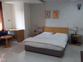 Hotel Kasturi International - Chambre
