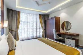 Al Qasr Hotel Suites - Albadie District  - Værelse