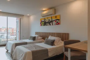 Travelers Orange Suites - Room