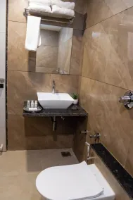 Hotel Dev Corporate Ahmedabad  - Salle de bain