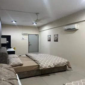 The Suncity Inn - Habitación