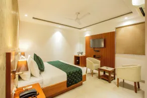 Hotel Arch Suites - Chambre