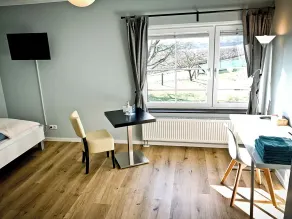 triple a Apartments in Altfeld - Vista do quarto