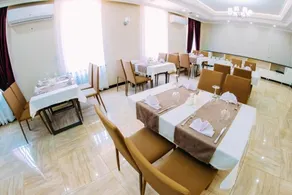 Osh Grand Hotel Chavo - Restaurante