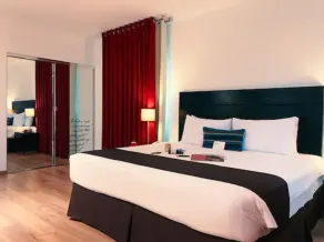 El Polo Hotel & Suites - Room