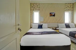 Omah Kalimosodo Mitra RedDoorz near Stasiun Malang Kota Baru - Room