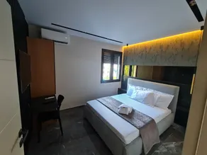 La Mirage Suites & Apartments - Habitación