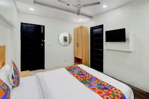 Fabhotel Veda Inn - Quarto