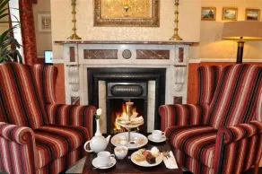 Maples House Hotel - Siddeområde i lobbyen