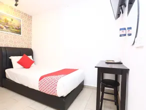 OYO 718 Mr J Hotel Wakaf Che Yeh 1 - Chambre