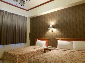 Kai Xin Hotel - Habitación