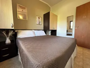 Appartement de vacances \"orchidea\" avec piscine et plage privée -2 - Chambre