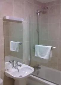 The Windmill Hotel - Baño
