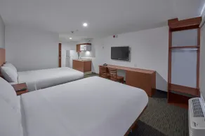 Extended Suites Monterrey Aeropuerto - Chambre
